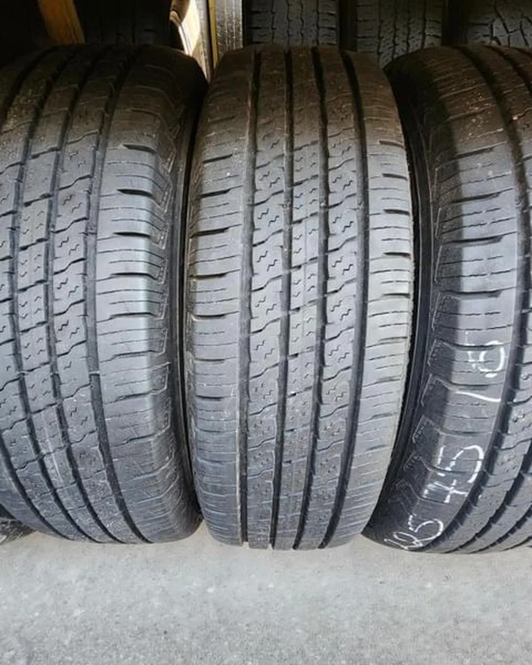 Close-up of used tire tread at Direct Tire Zone